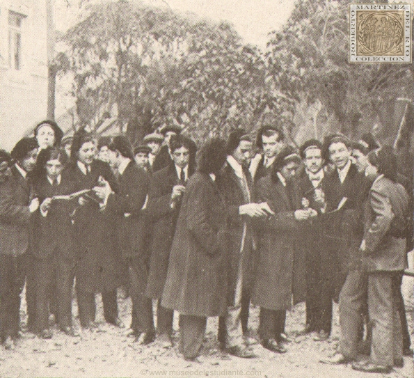 Group of students in Madrid with the beret adopted as a badge of studying class